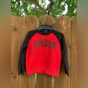 Vintage Jordan sweatshirt size 2T, black/red spell out logo.